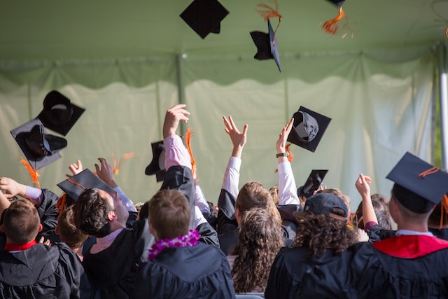 Photo by Emily Ranquist: https://www.pexels.com/photo/photography-of-people-graduating-1205651/